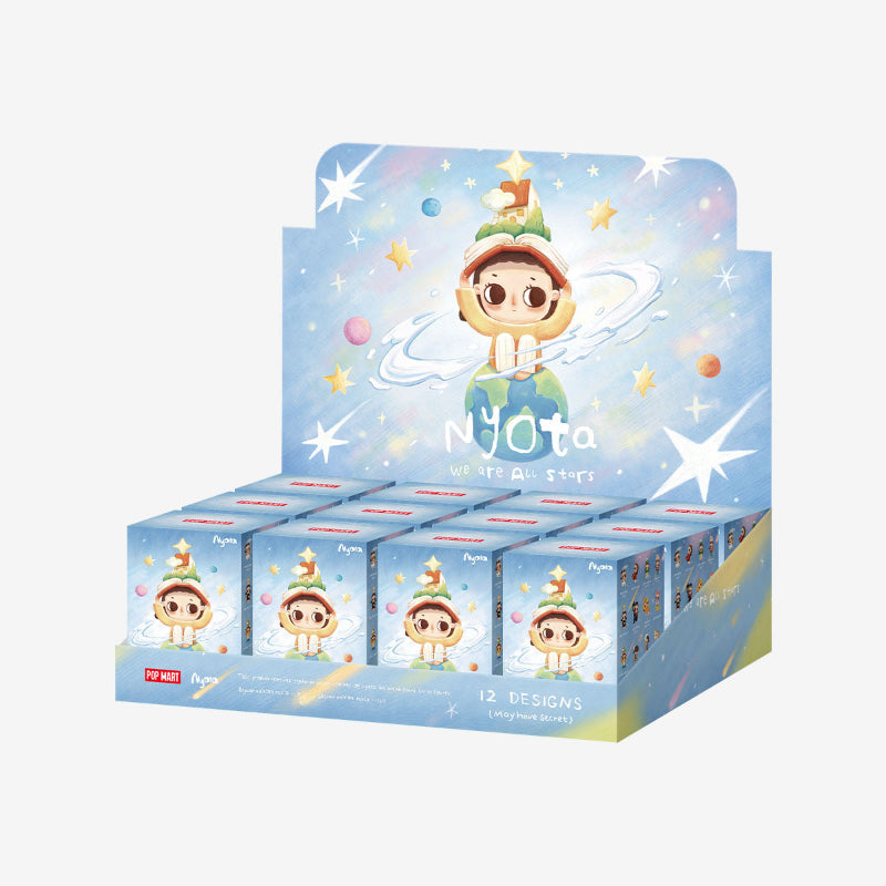 Display box of NJOta figurines with cartoon character on a light blue background