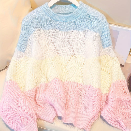 Color-blocked sweater on a hanger with a neutral background