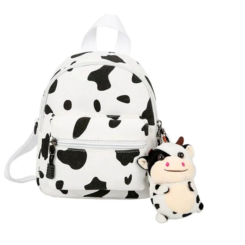 kawaii mini backpack purse Mini Canvas Daypack With Plush Cow Pendant Cow Print Backpack Adorable Backpack For Women Lady Girls Outdoor Travel Shopping (white)(1pcs)