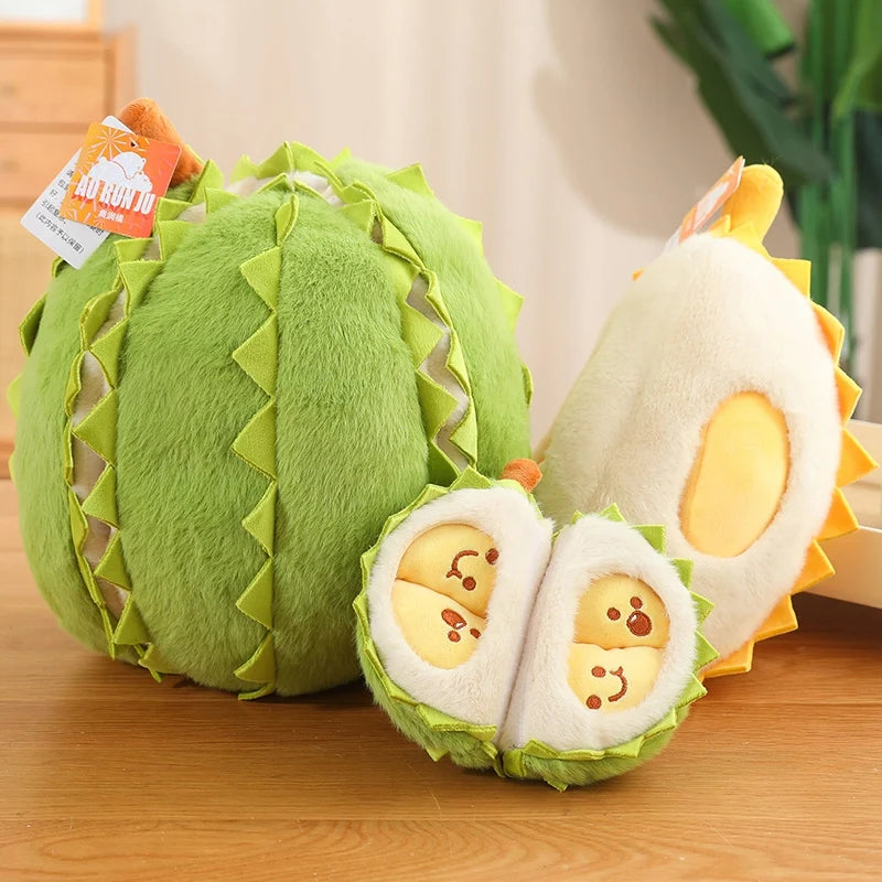 Plush toy resembling a durian fruit with a smiling face on a wooden surface.