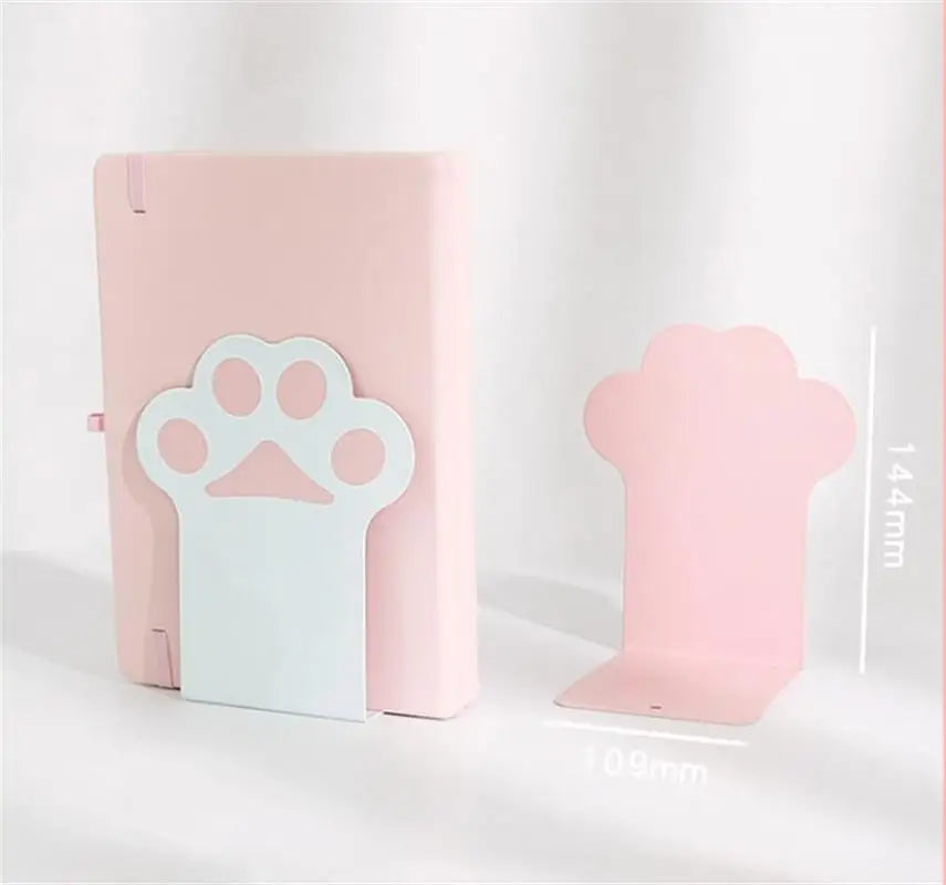 Pink paw-shaped bookends on a white background