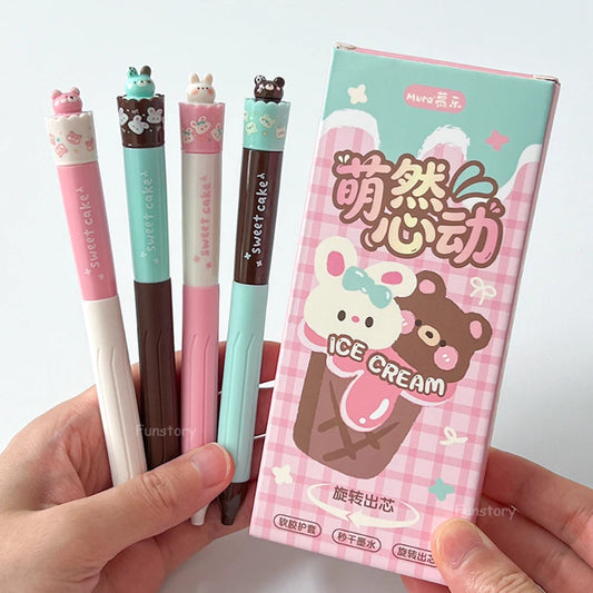 Four colorful pens with cartoon animal tops held by a hand, next to their packaging on a light gray background.