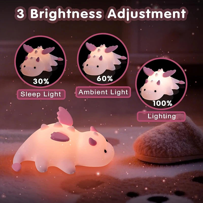 Cute dragon-shaped night light with brightness adjustment options on a soft background.
