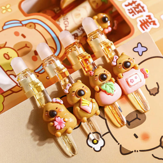 Set of cute capybara pens inside of a notebook on a cartoon-themed background