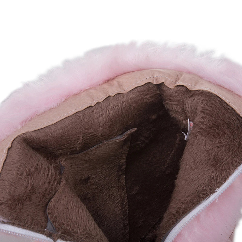 Close-up of a brown plush interior with pink exterior of the boot