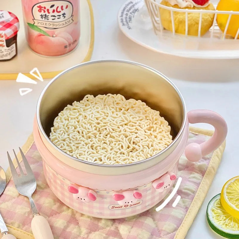 Pink ramen bowl with instant noodles on a table with fruit and drinks.