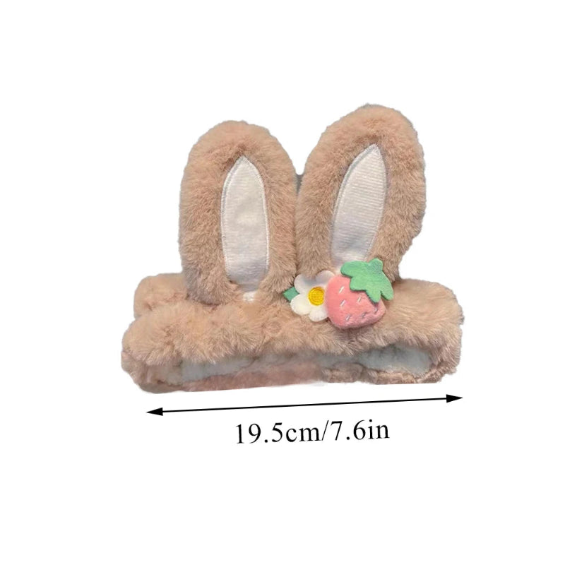 Fluffy bunny ears headband with a strawberry and flower decoration, shown with measurements on a white background.