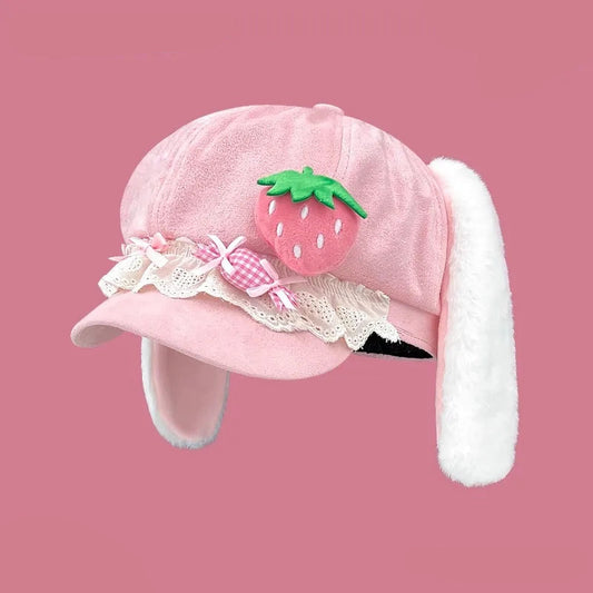 Pink kawaii bunny hat with strawberry design on a pink background