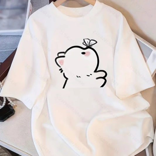 White shirt with a kawaii black outlined cat , and a tiny butterfly design on a wooden hanger