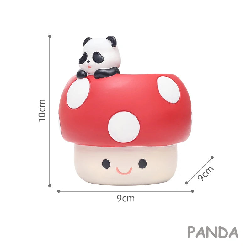 Cute panda figurine on a red mushroom with measurements.