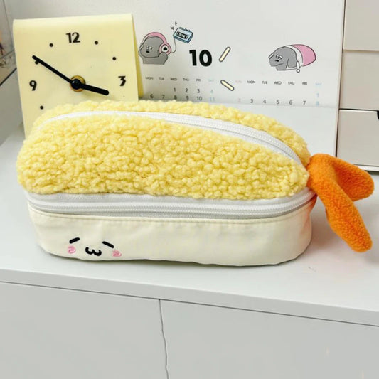 Kawaii yellow tempura shrimp plush pencil case with on a white surface