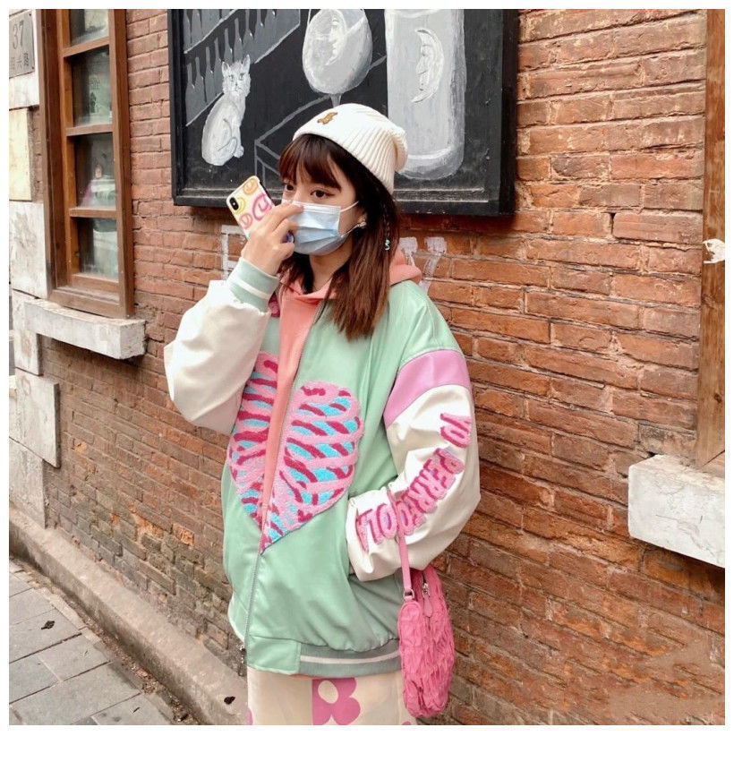 Girl Wearing Kawaii Pastel Skeleton Heart Jacket