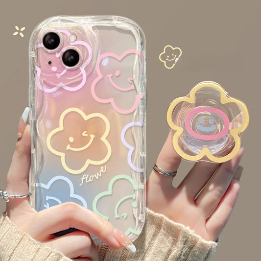 A woman is holding one of the designs for the Kawaii Cherry Blossom Samsung Phone Case, this is the chunky drawn flower design case with phone grip that attaches to it.