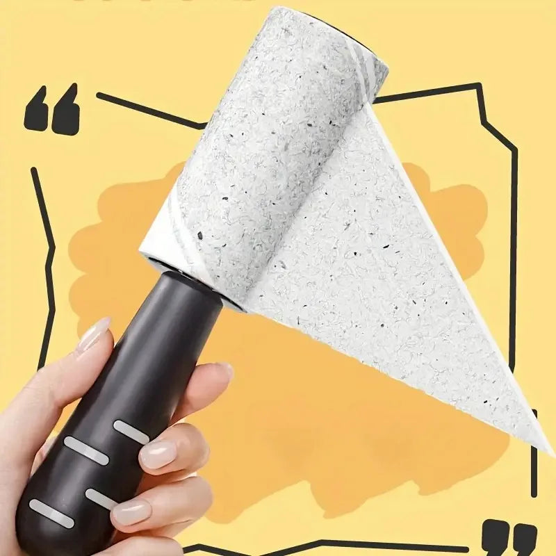Hand holding a pet hair removal roller against a yellow background