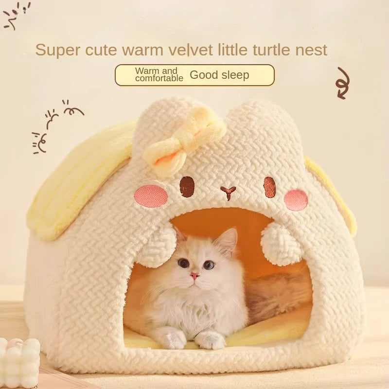 Cat inside a cute cat-shaped pet bed with text about warmth and comfort.