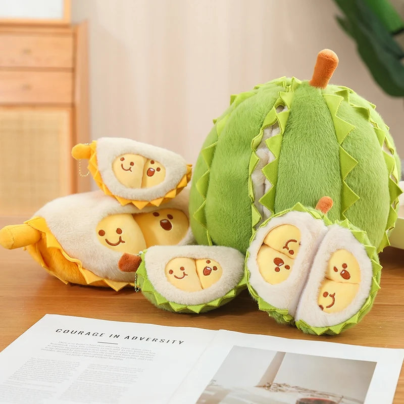 Plush toy resembling a green fruit with face designs on a wooden surface