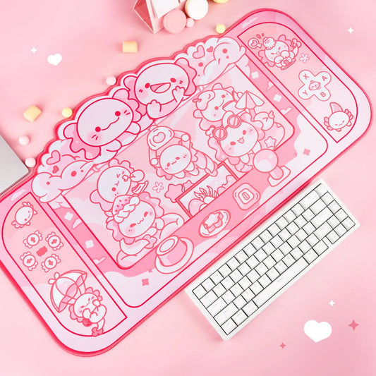Pink cartoon-themed mouse pad with a keyboard on a pink background