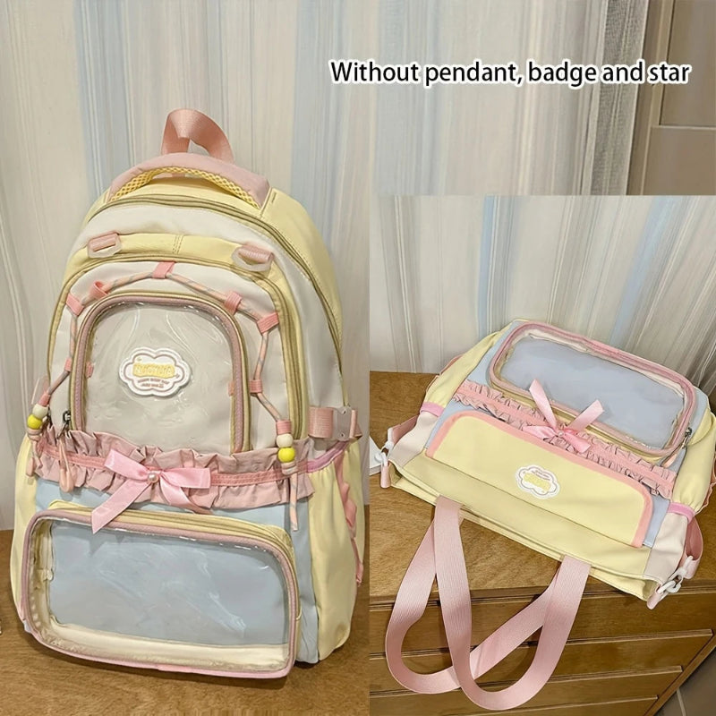 Pastel-colored backpack with pink ribbons and a matching tote bag on a wooden surface.