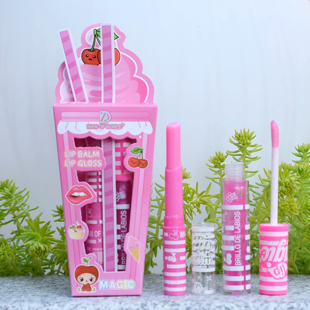 Pink cherry flavored lip balm and gloss set with packaging on a white background