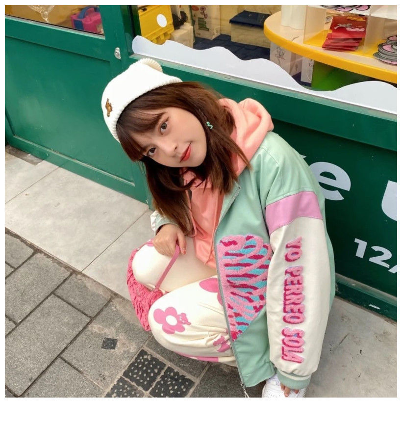 Girl Wearing Kawaii Pastel Skeleton Heart Jacket