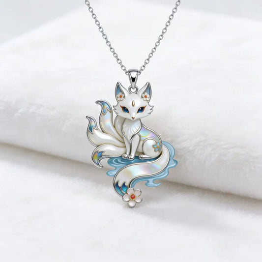 Silver Kitsune pendant necklace on a white background