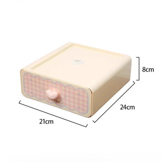 Rectangular beige and pink storage box with dimensions labeled on a white background