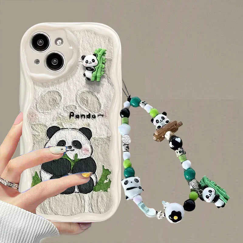 women holding a kawaii panda samsung phone white case with no ears displaying a bamboo sat down eating bamboo on the case with a beaded phone charm attached