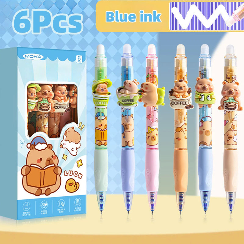 Set of six capybara pens with blue ink, displayed with packaging on a light background.