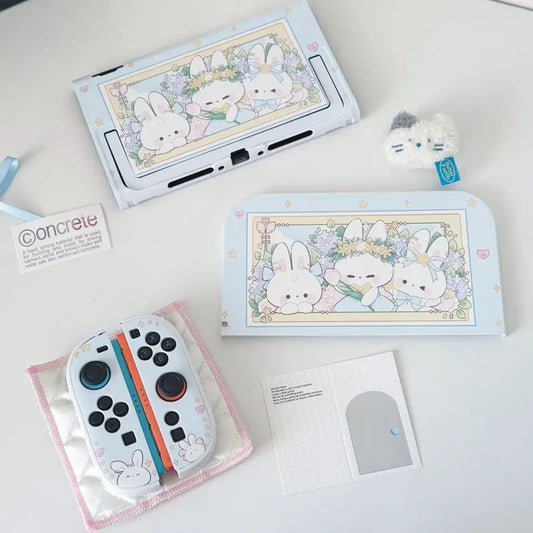 Gaming console with cute rabbit design on screen and controller on a white surface