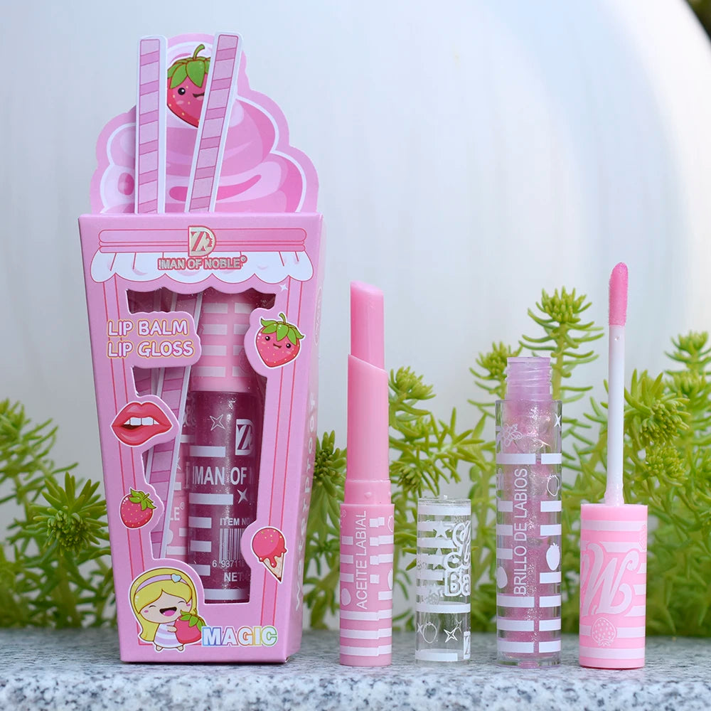 Pink strawberry lip balm and lip gloss set with packaging on a white background