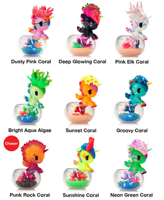 Collection of colorful coral-themed figurines in small glass bowls on a white background.