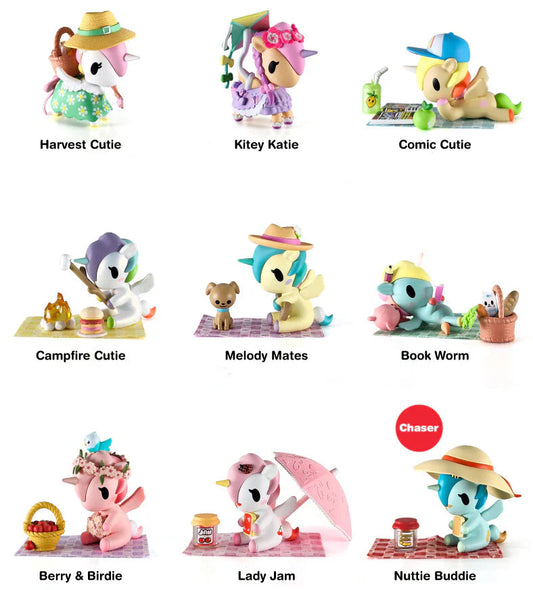 Collection of kawaii blind box figurines with various poses and accessories on a white background