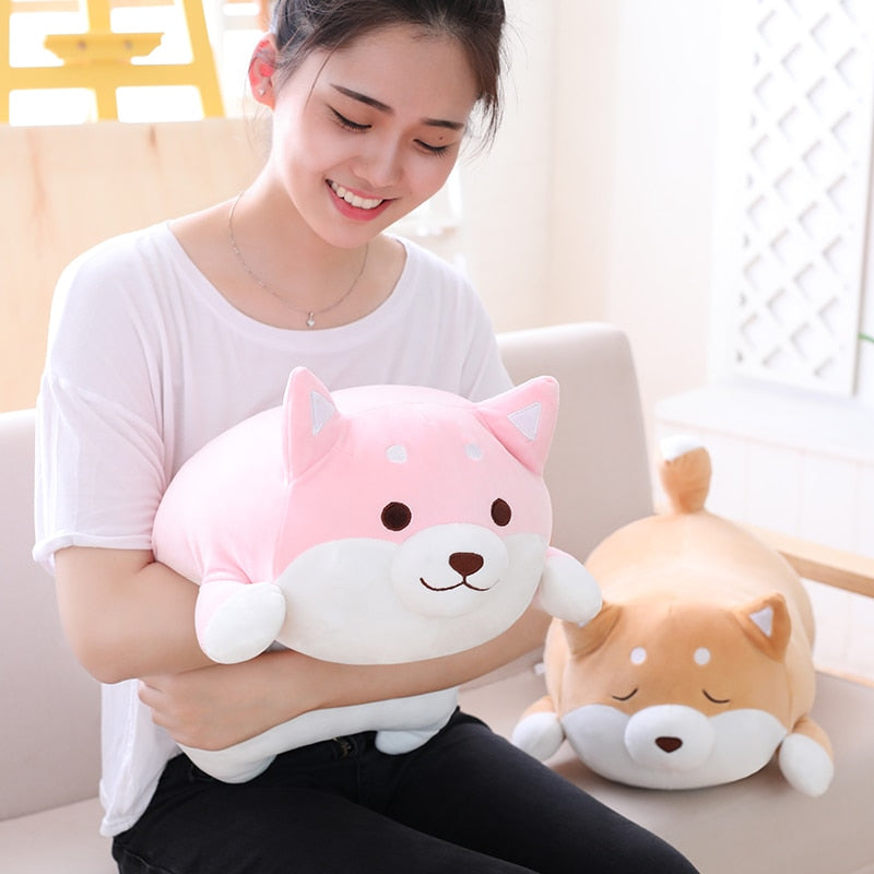 Model Holding a Pink Shiba Inu Plushie
