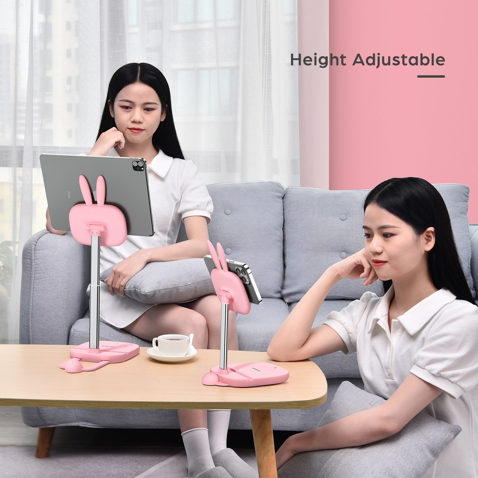 Girls Using Kawaii Bunny Phone & Tablet Stands on a Coffee Table