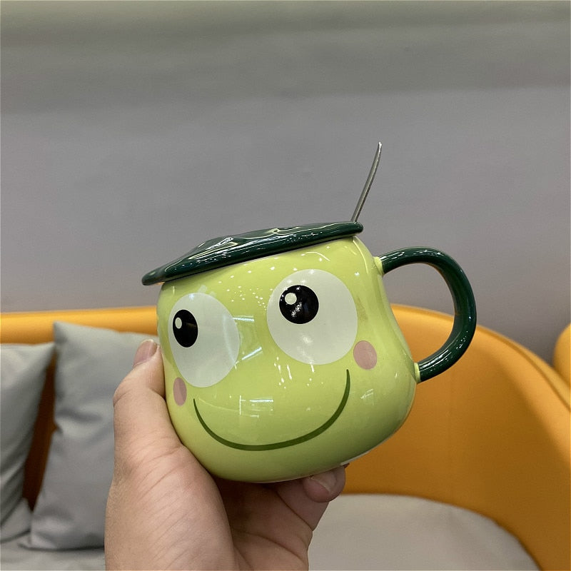 Hand Holding Frog Mug With Lid & Spoon