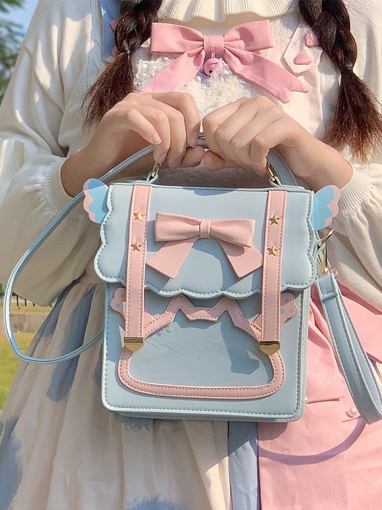 Model Holding Kawaii Pastel Blue and Pink Bow Backpack
