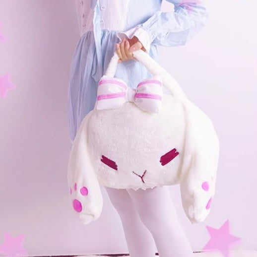 Model Holding Bunny Plushie Backpack