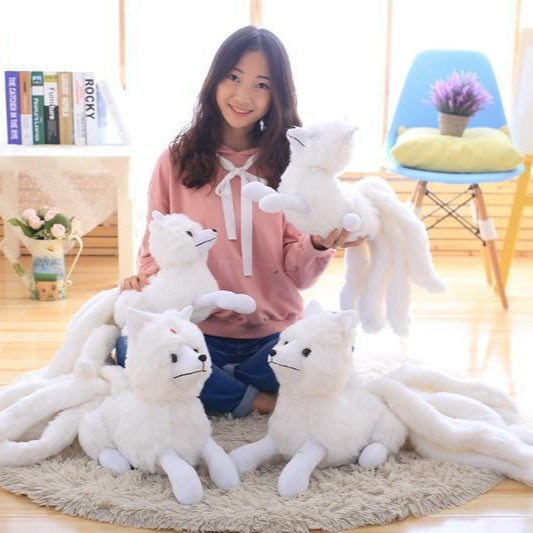 Girl With Four Kitsune Plushies