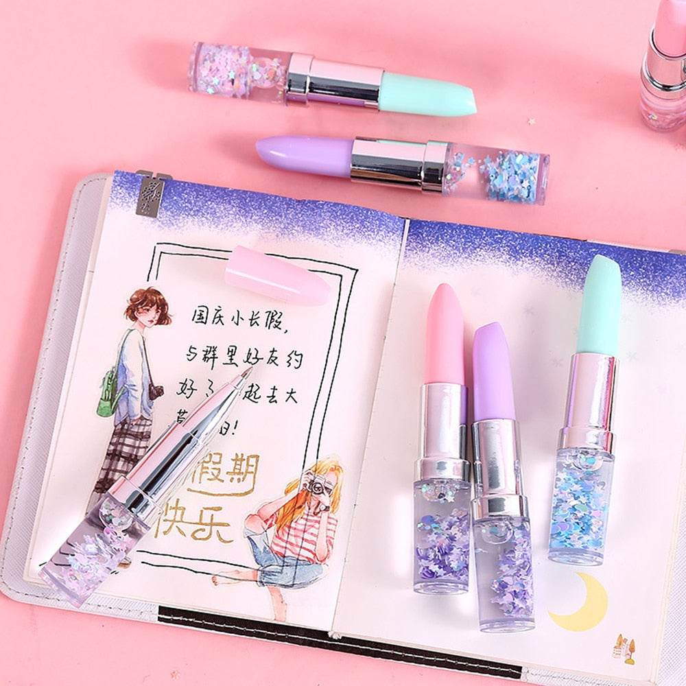 Lipstick Glitter Pens On a Book