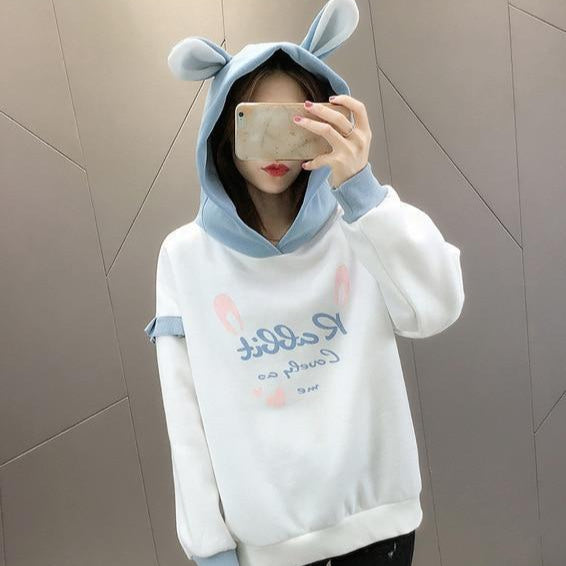 Model Wearing our White and Blue Rabbit Hoodie