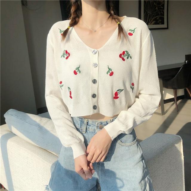 Model Wearing Kawaii White Floral Knitted Crop Cardigan