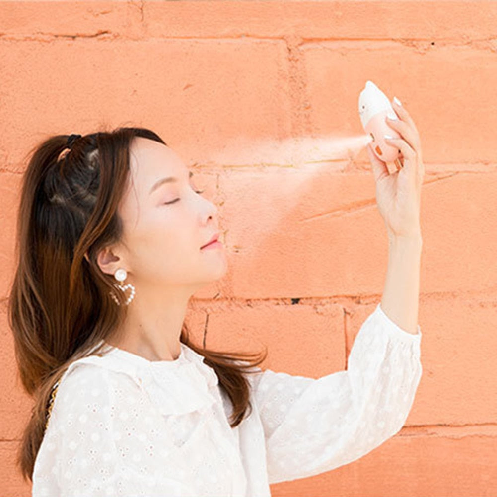 Girl Misting With Our Kawaii Cat Face Humidifier