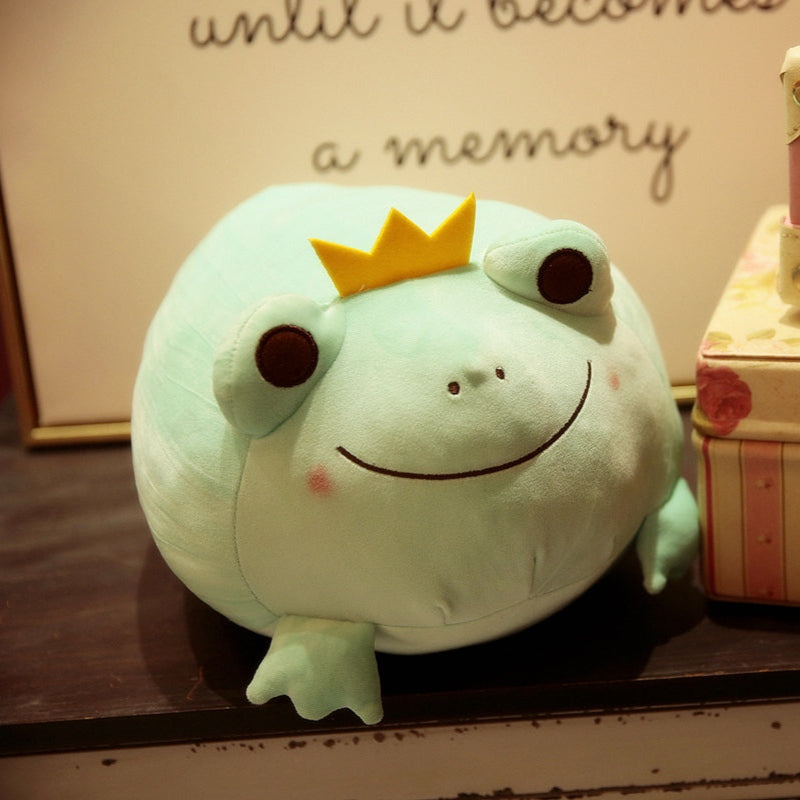 Kawaii Frog Prince Plushie Next To Luggage