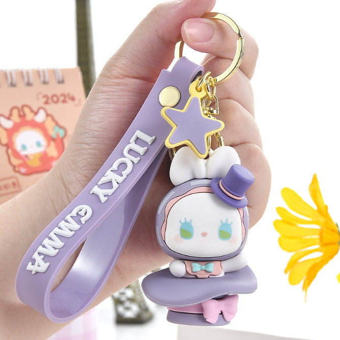 Lucky Emma Baby Keychain, this is one of the many options you can get, displayed by a person holding the keychain