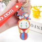 Lucky Emma Baby Keychain, this is one of the many options you can get, displayed by a person holding the keychain