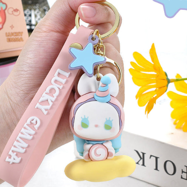 Lucky Emma Baby Keychain, this is one of the many options you can get, displayed by a person holding the keychain
