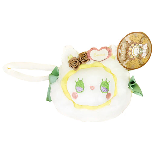 Plush toy coin purse with decorative elements on a white background