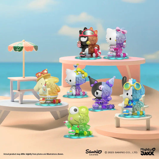 Colorful Sanrio character figurines on a beach setting with ocean and sky in the background.