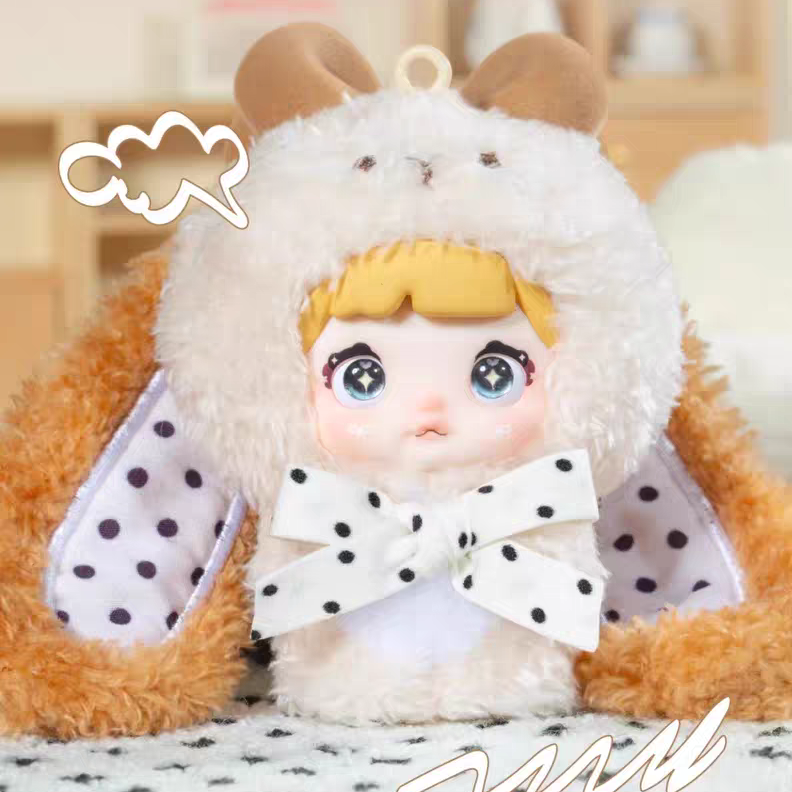 Plush toy with a character design on a blurred background