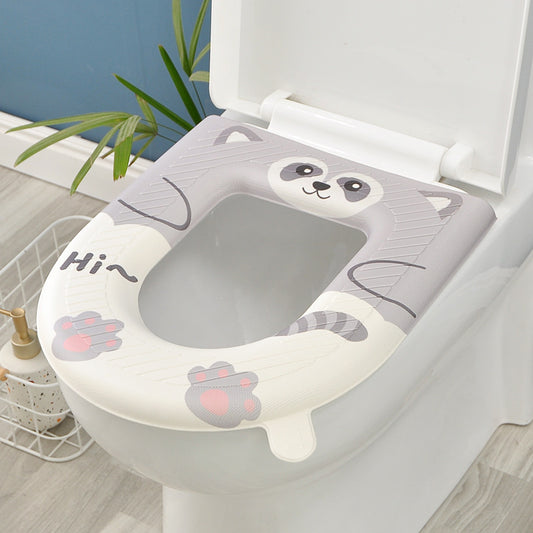 Cute grey and white EVA toilet seat cover with kawaii racoon face design and paw prints saying Hi